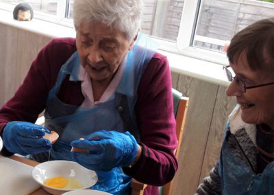 Residents baking a lemon meringue pie at Lulworth House 2