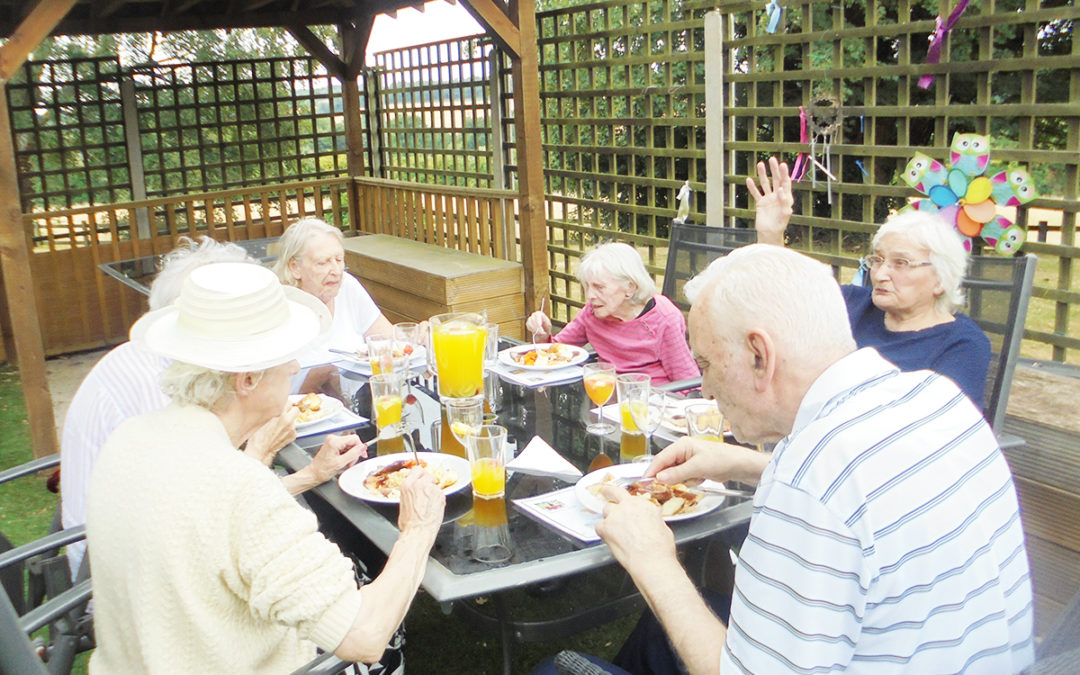 Sunday lunching in the sun at The Old Downs Residential Care Home