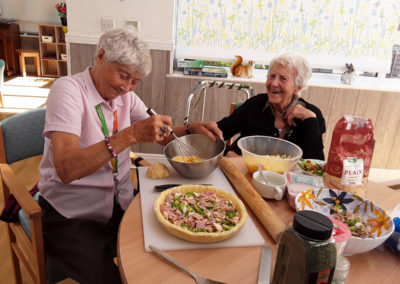 Residents assembling the quiche