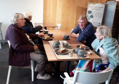 Residents in a cafe at Millbrook Garden Centre