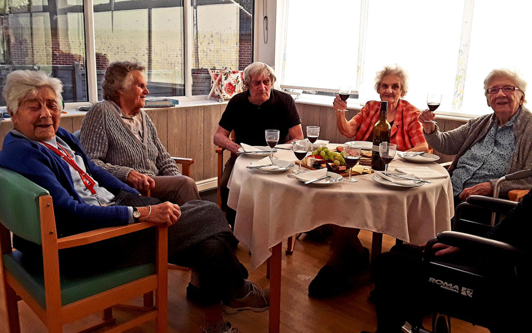 Group cheese and wine tasting at The Old Downs Residential Care Home