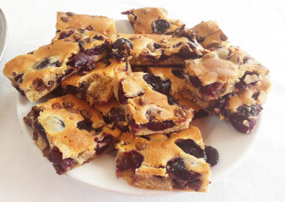 A plate of chocolate chip cherry bars