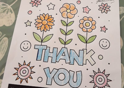 A thank you card, coloured by a resident at The Old Downs