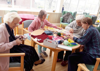 Residents at Sewing Club at The Old Downs Residential Care Home