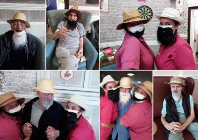The Old Downs Residential Care Home staff and residents wearing beards and taking selfies