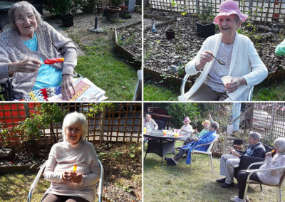The Old Downs Residential Care Home residents enjoying iced creams and lollies in their garden
