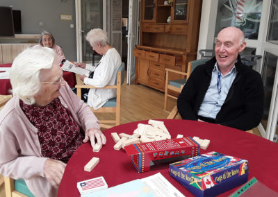 The Old Downs Residential Care Home resident with their fallen Jenga bricks
