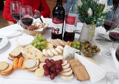 Selection of cheeses and wine at The Old Downs Residential Care Home