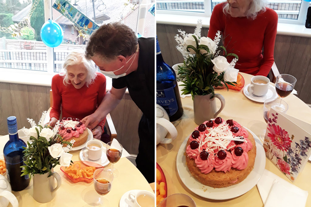 Veronica with her birthday cake at The Old Downs Residential Care Home
