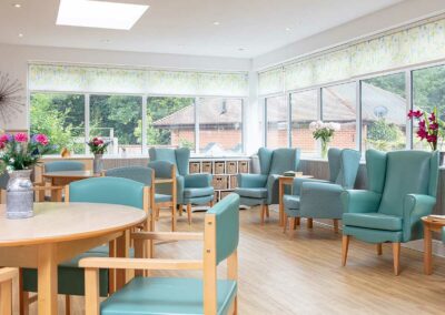 The large conservatory at The Old Downs Residential Care Home
