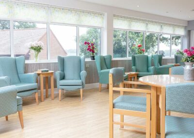 The large conservatory at The Old Downs Residential Care Home