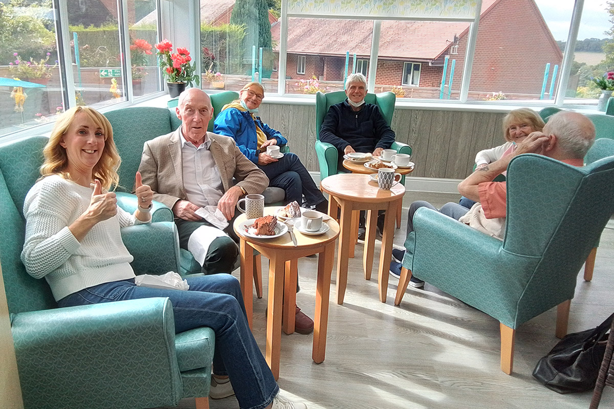 Macmillan Coffee Morning with family members at The Old Downs Residential Care Home