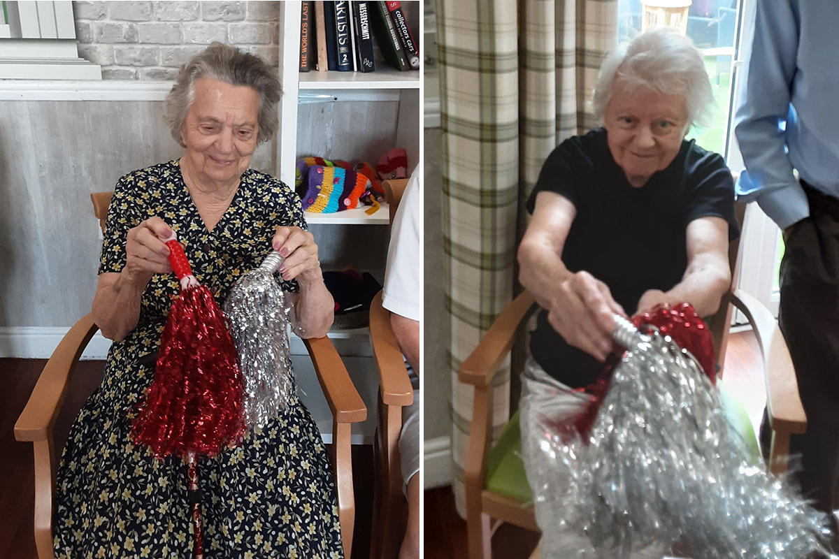 The Old Downs Residential Care Home residents keep fit with pom pom arm exercises