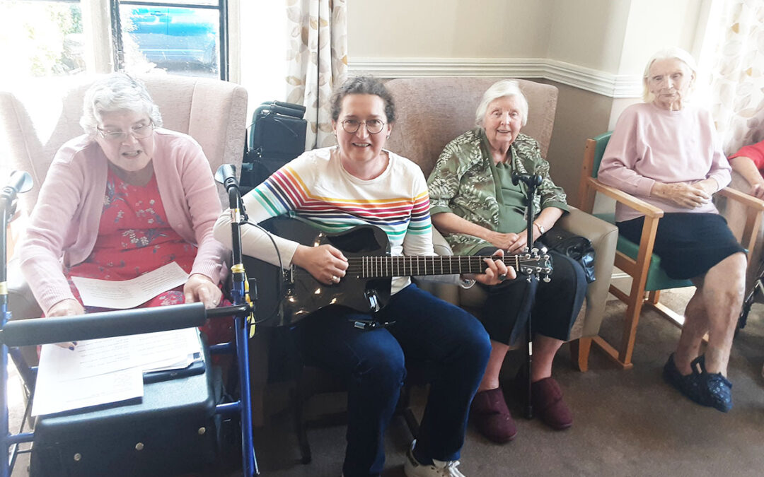 Guitar music entertainment at The Old Downs Residential Care Home