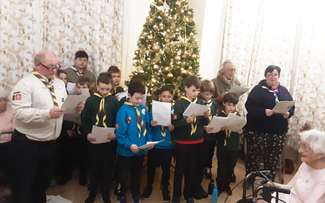 Singing Christmas carols at The Old Downs Residential Care Home