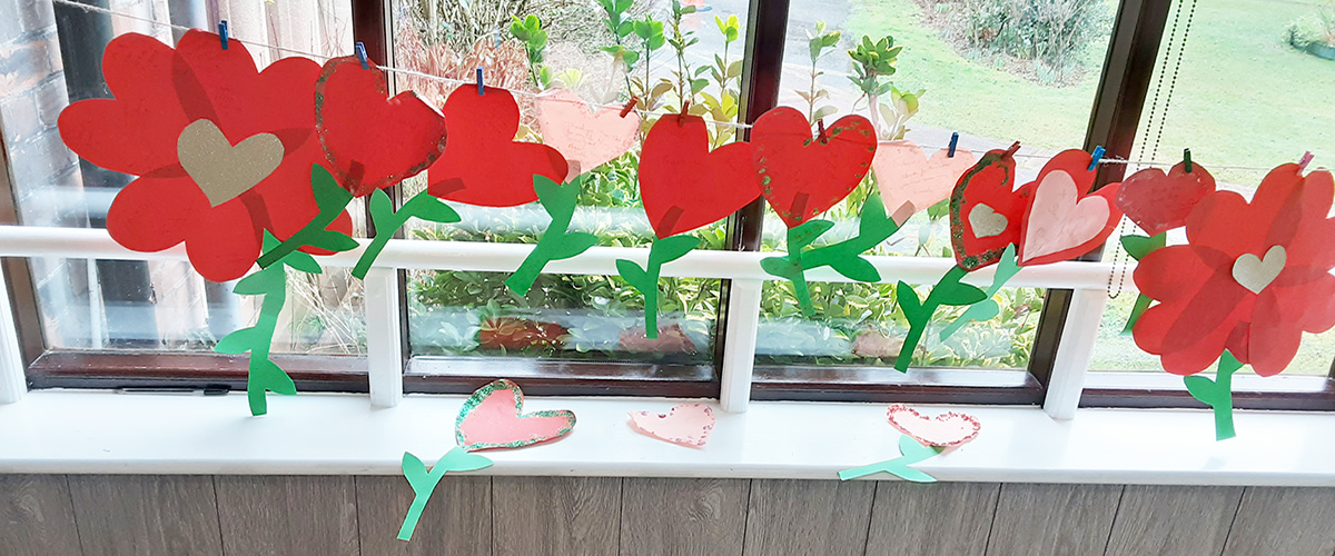 Heart flower decorations at The Old Downs Residential Care Home