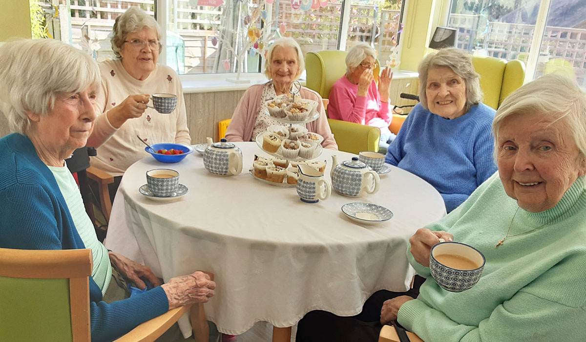 Enjoying tea and cakes for Easter at The Old Downs Residential Care Home