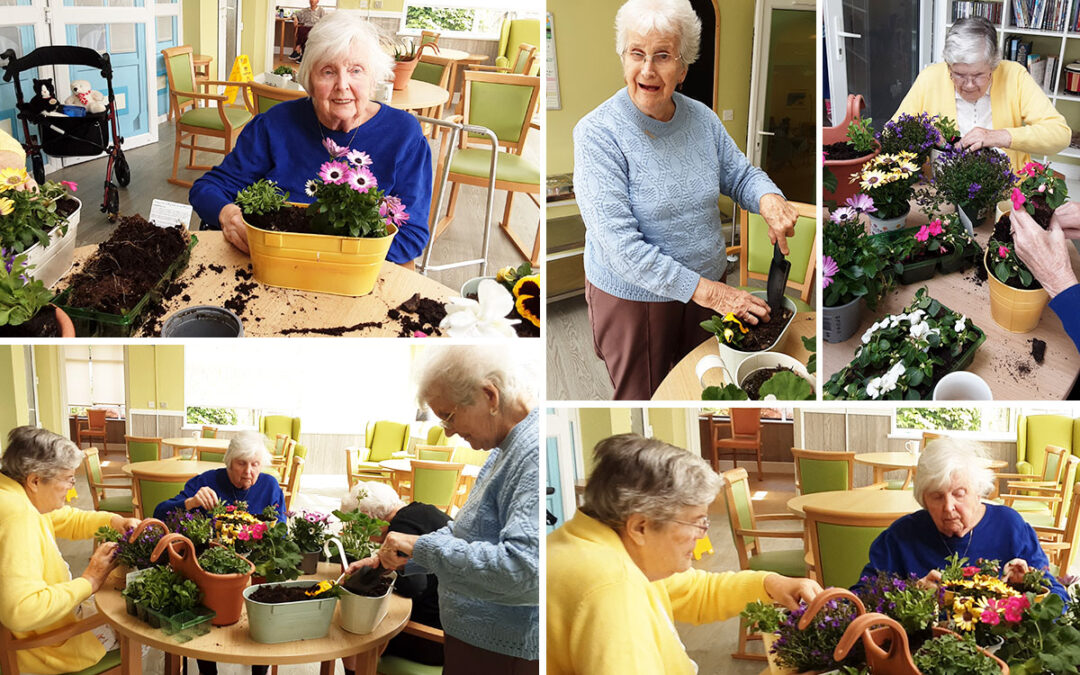Basket planting and relaxing pastimes at The Old Downs Residential Care Home