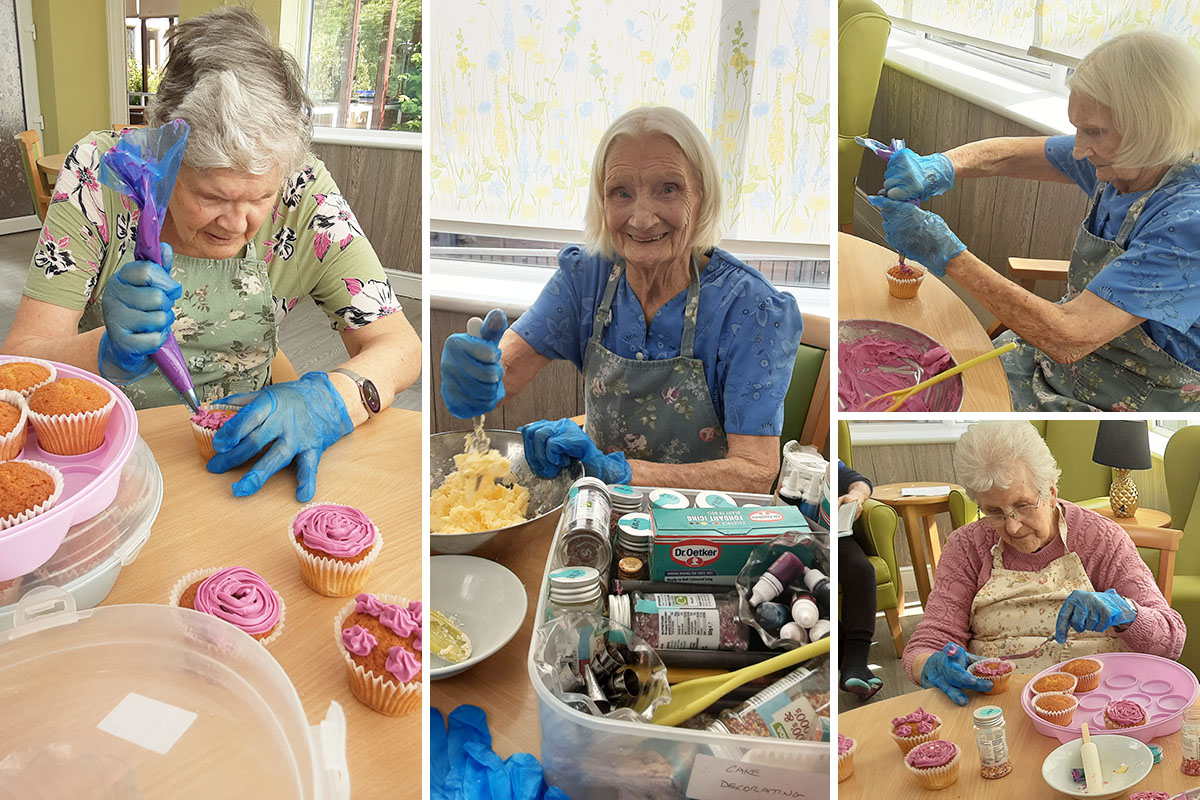 Residents at The Old Downs Residential Care Home decorate cupcakes