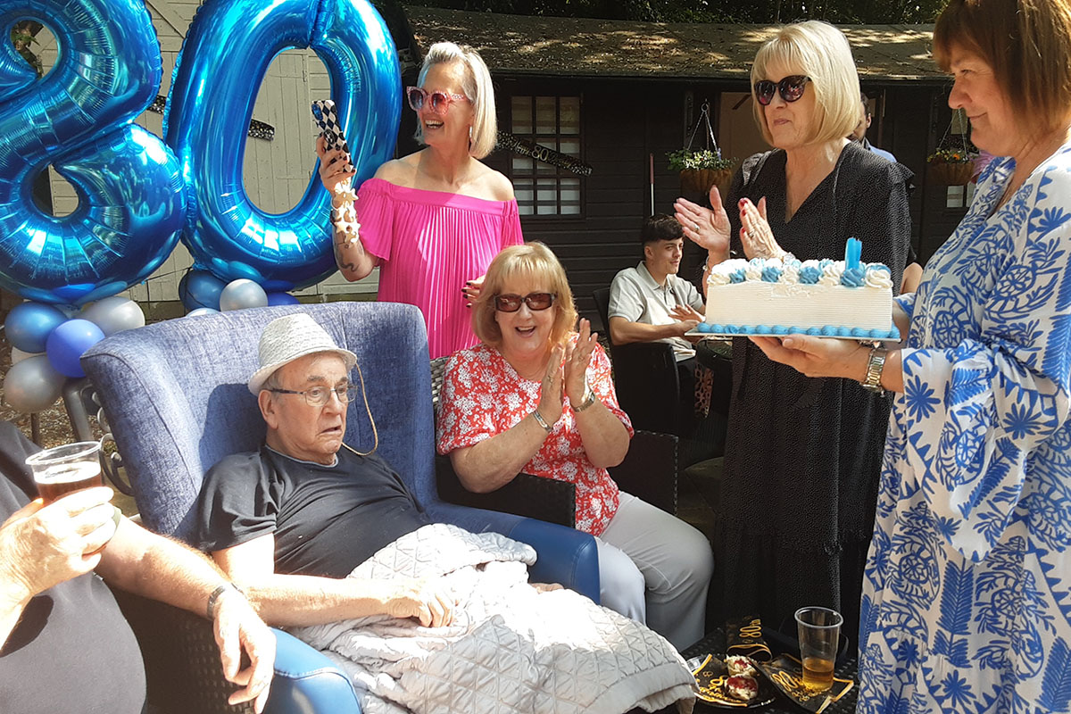 Birthday party fun for John at The Old Downs Residential Care Home