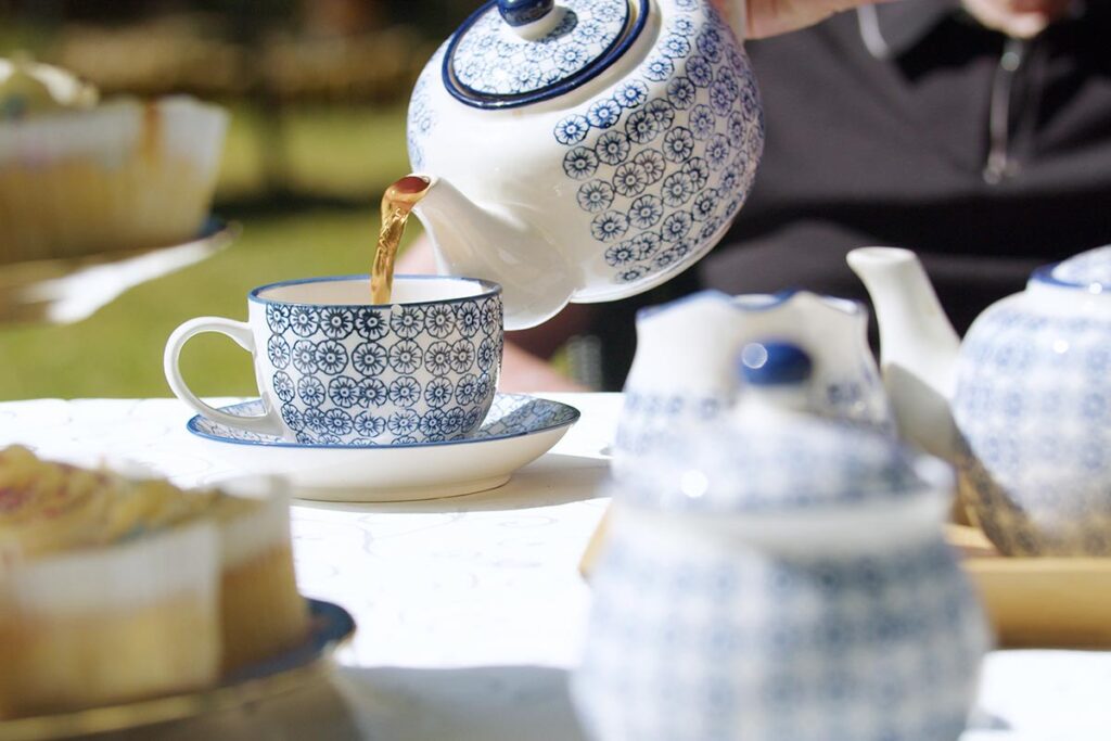 Afternoon tea in the garden at The Old Downs Residential Care Home
