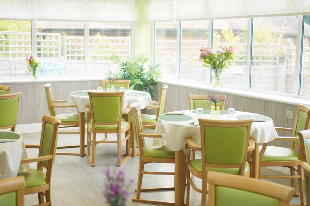 A dining area in The Old Downs Residential Care Home