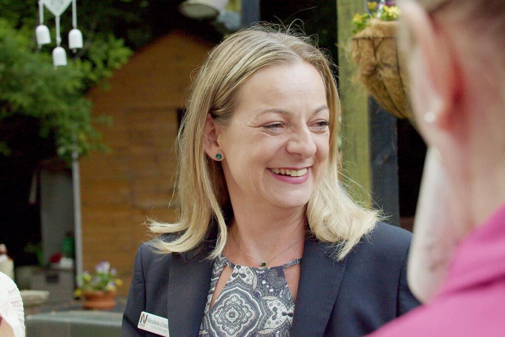 Home Manager Nicoleta and team members at The Old Downs Residential Care Home