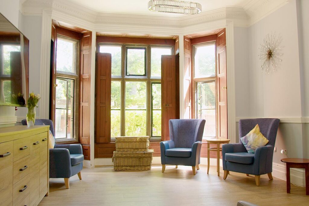 A lounge area in The Old Downs Residential Care Home