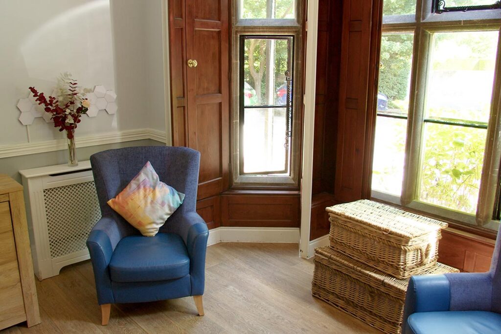A lounge area in The Old Downs Residential Care Home
