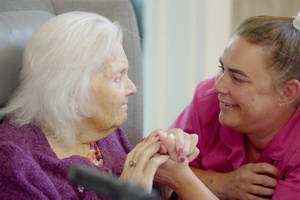 One of our residents and team members at The Old Downs Residential Care Home