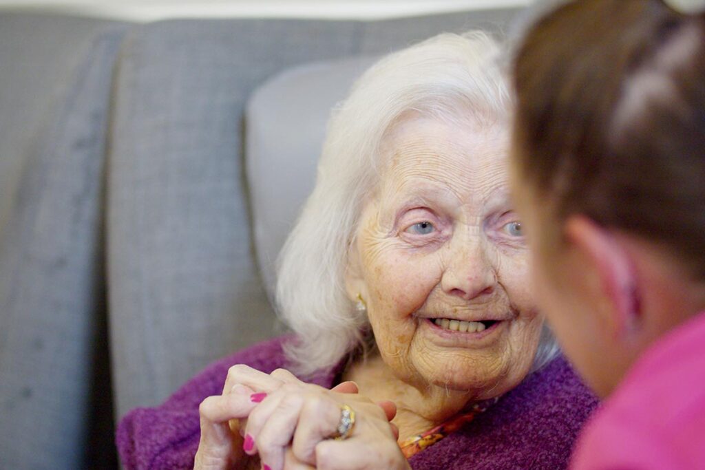 One of our residents and team members at The Old Downs Residential Care Home