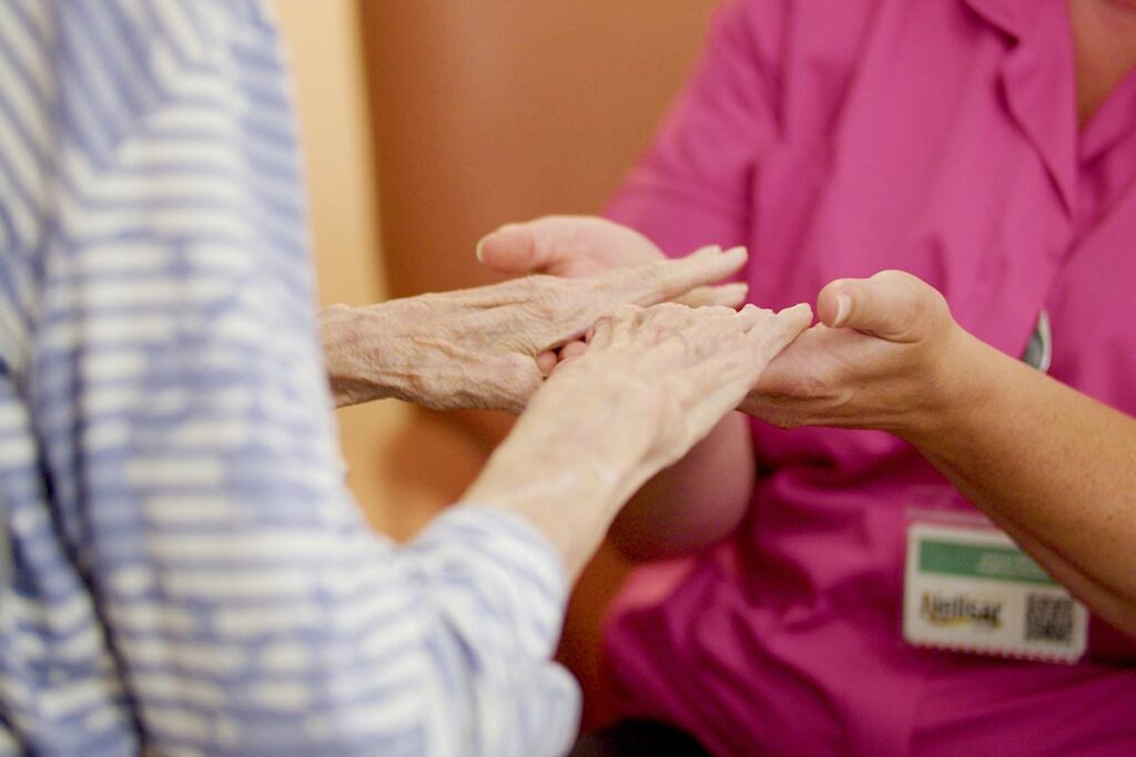 One of our residents and team members at The Old Downs Residential Care Home