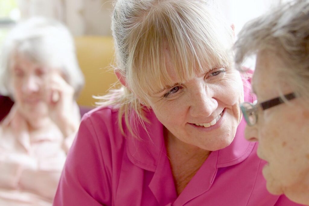One of our residents and team members at The Old Downs Residential Care Home