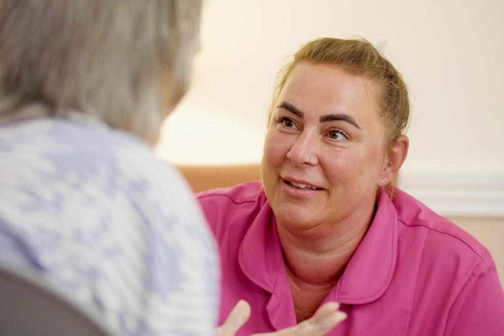 One of our residents and team members at The Old Downs Residential Care Home