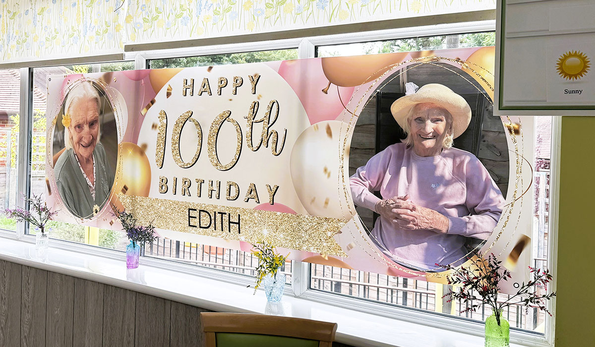 Happy 100th birthday banner at The Old Downs Residential Care Home