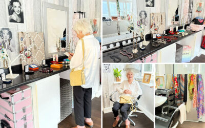 A resident at The Old Downs explores the pop-up shop, with displays of jewellery, scarves, toiletries, and handmade crafts created by fellow residents.