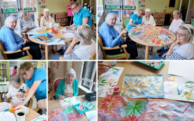 Our residents at The Old Downs Residential Care Home creating colourful firework-inspired artwork during an arts and crafts session.