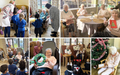 Residents at The Old Downs Residential Care Home sharing a seasonal visit, music and festive gifts with local school children during their visit to the Home with their teachers.