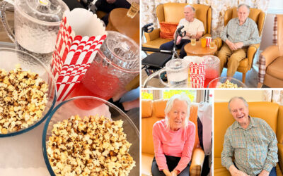 Residents at The Old Downs Residential Care Home watching a classic film together during a relaxed National Popcorn Day movie afternoon.